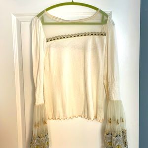 Super Cute Free People Top. Great Details. Fun to wear dressed up or down